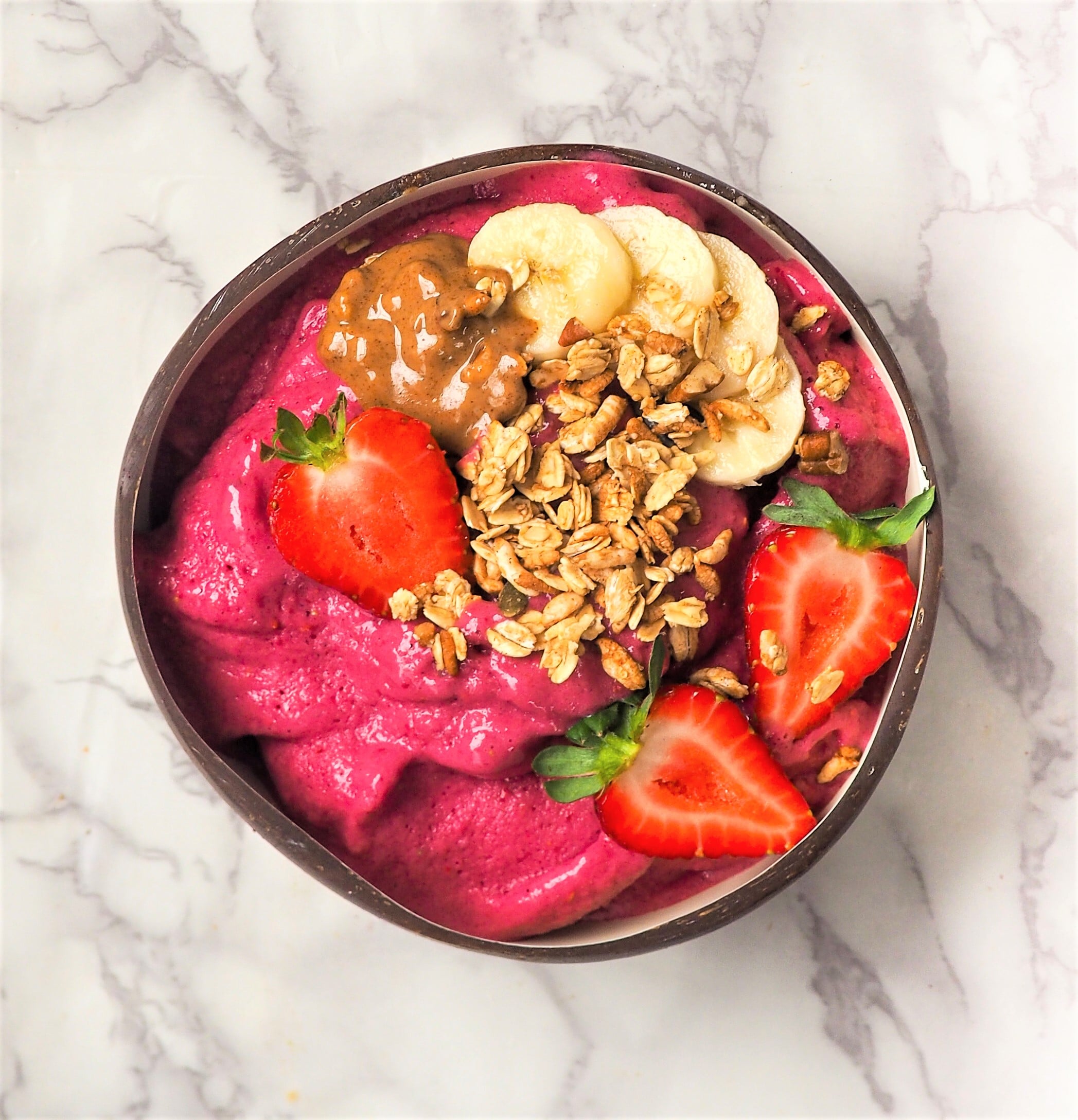 As far as smoothie bowls go, it doesn't get much prettier (or more pink) than this bowl. Packed with protein, vitamins, minerals and makes for a perfect summer breakfast or snack!